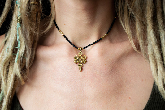 Infinity knot pendant necklace